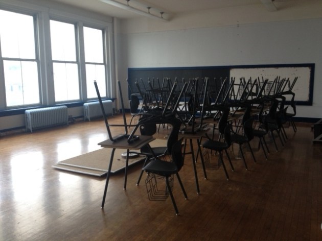 New Desks Being Moved into a 7th grade Classroom Image